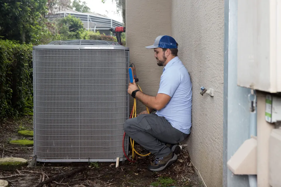 Indoor Air Quality & Ductwork - ACE Air Conditioning & Electrical technician at work