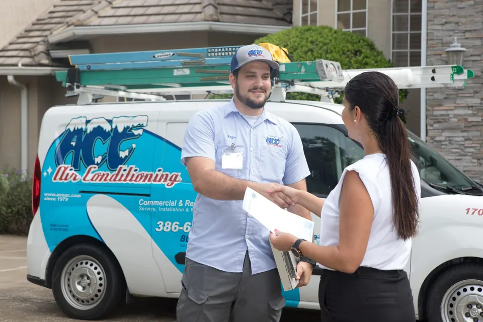 AC Tune-Ups & Maintenance Plans - ACE Air Conditioning & Electrical technician at work